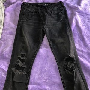 black ripped jeans